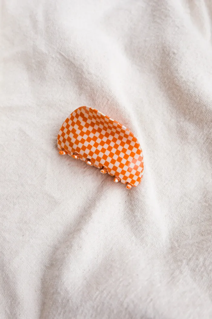 ASYMMETRICAL HAIR CLAW ORANGE CHECK