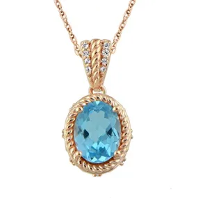 Jewelili 10K Rose Gold With Oval Shape Swiss Blue Topaz and Round White Topaz Halo Pendant Necklace