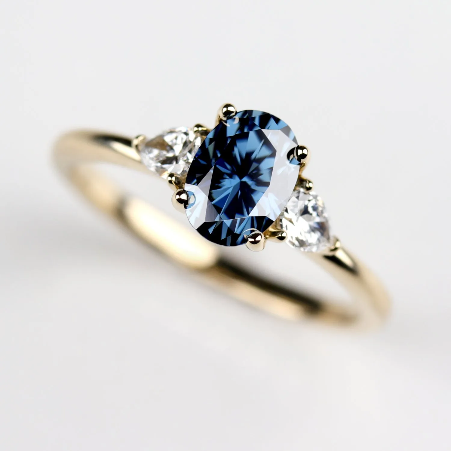 Oval Pear Basket Three Stone Ring with Oval Blue Moissanite