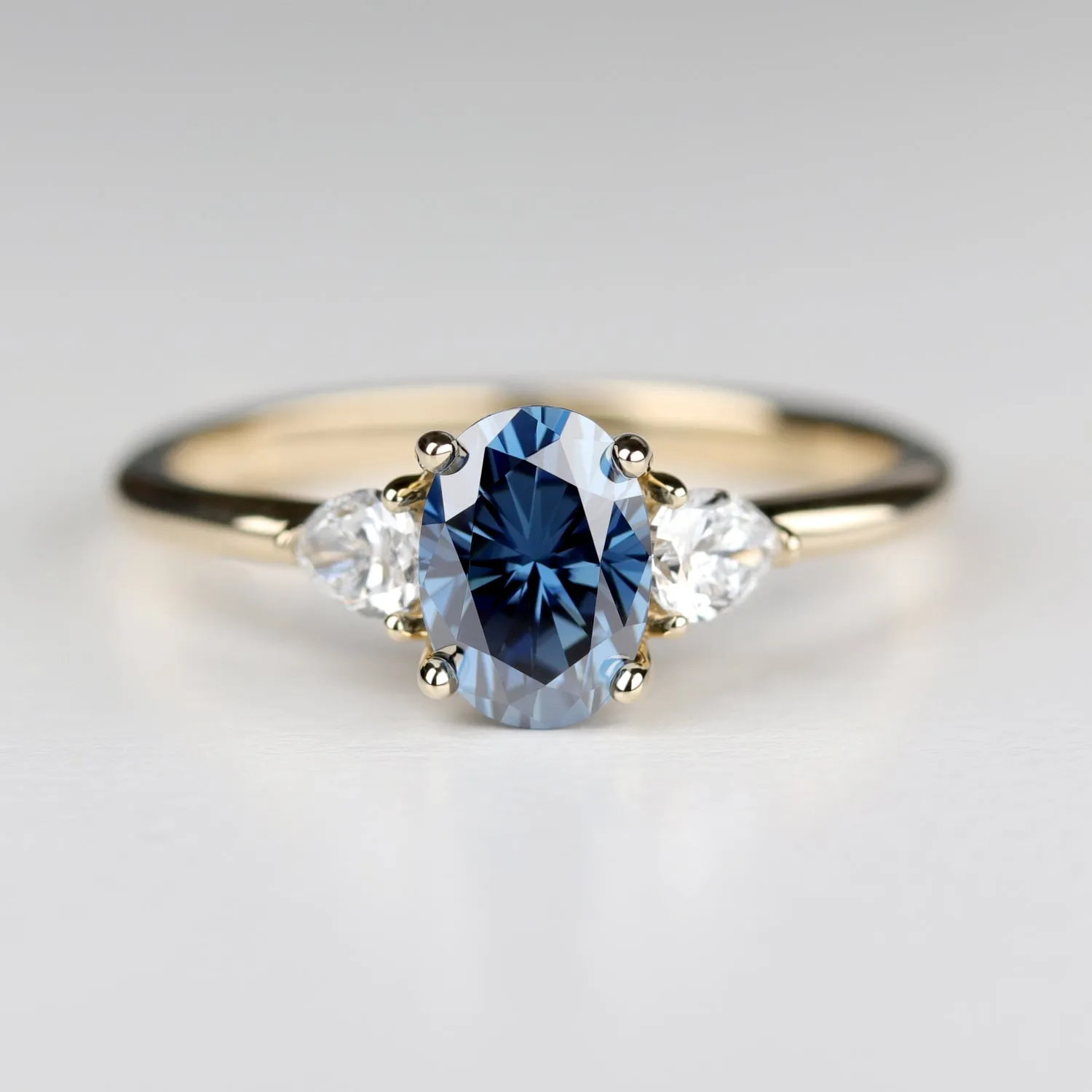 Oval Pear Basket Three Stone Ring with Oval Blue Moissanite